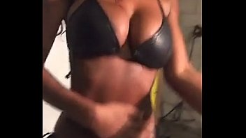 Hot busty black slutc covered in oil